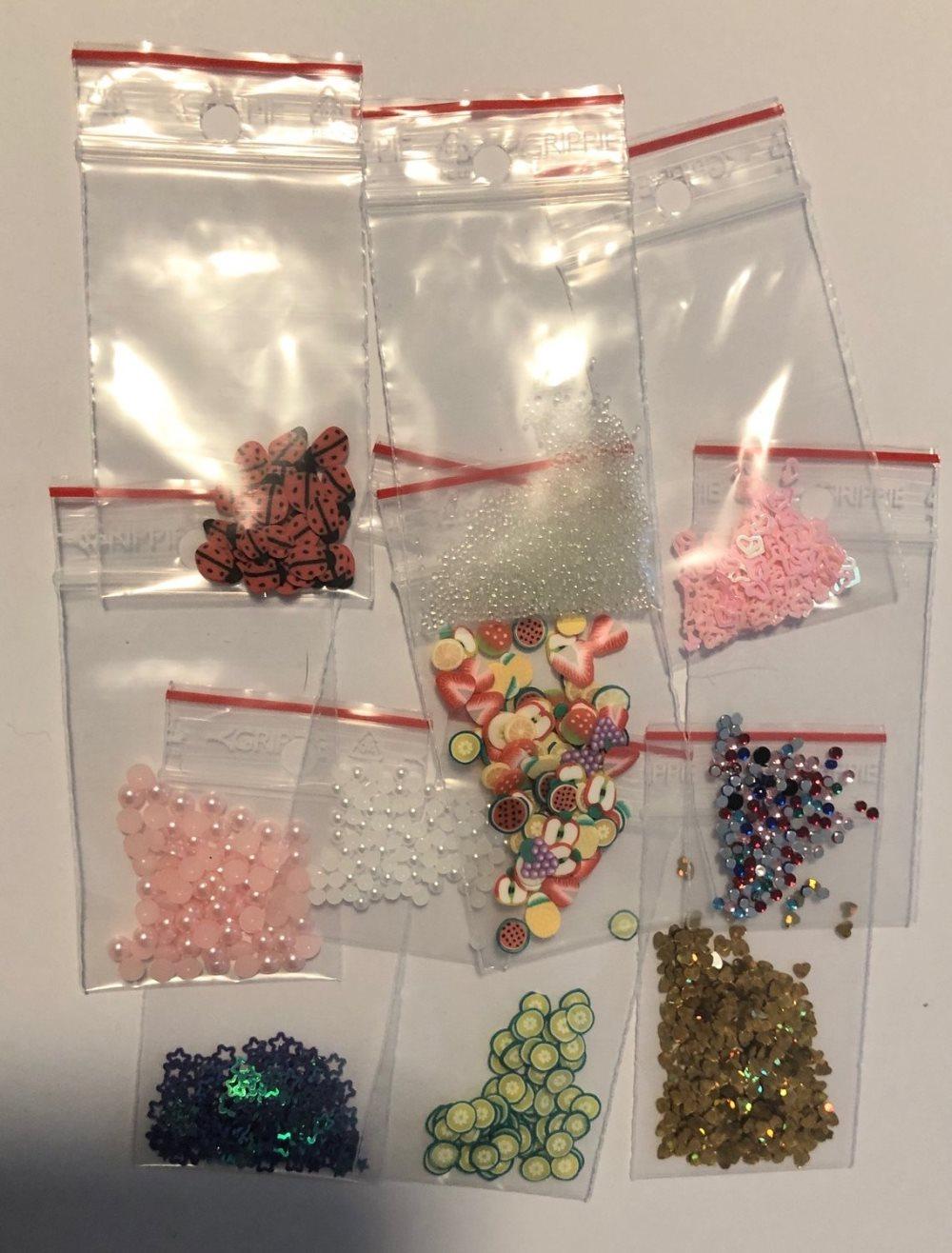 10 sorter olika nageldekorationer kit